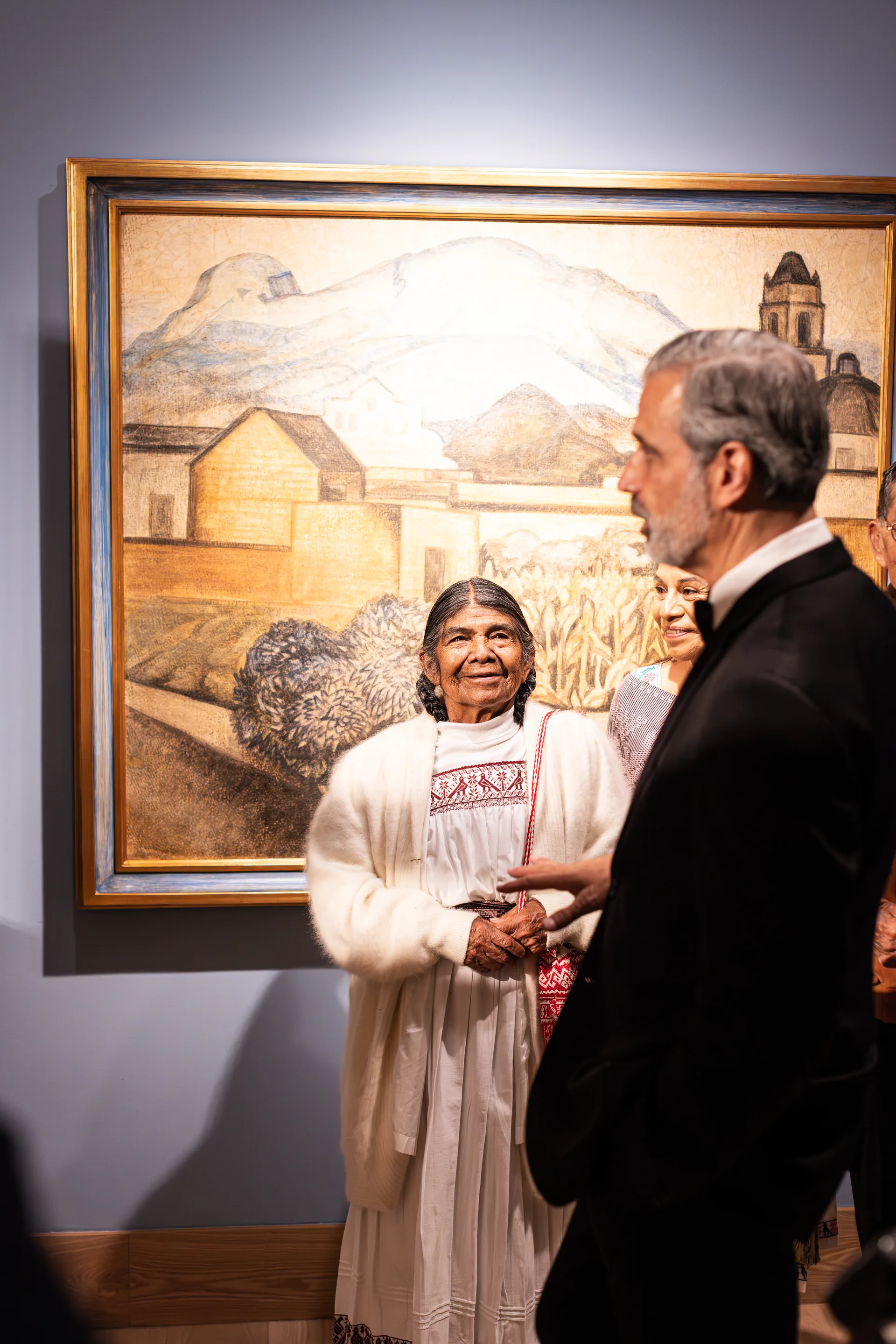 Gala guests with painting