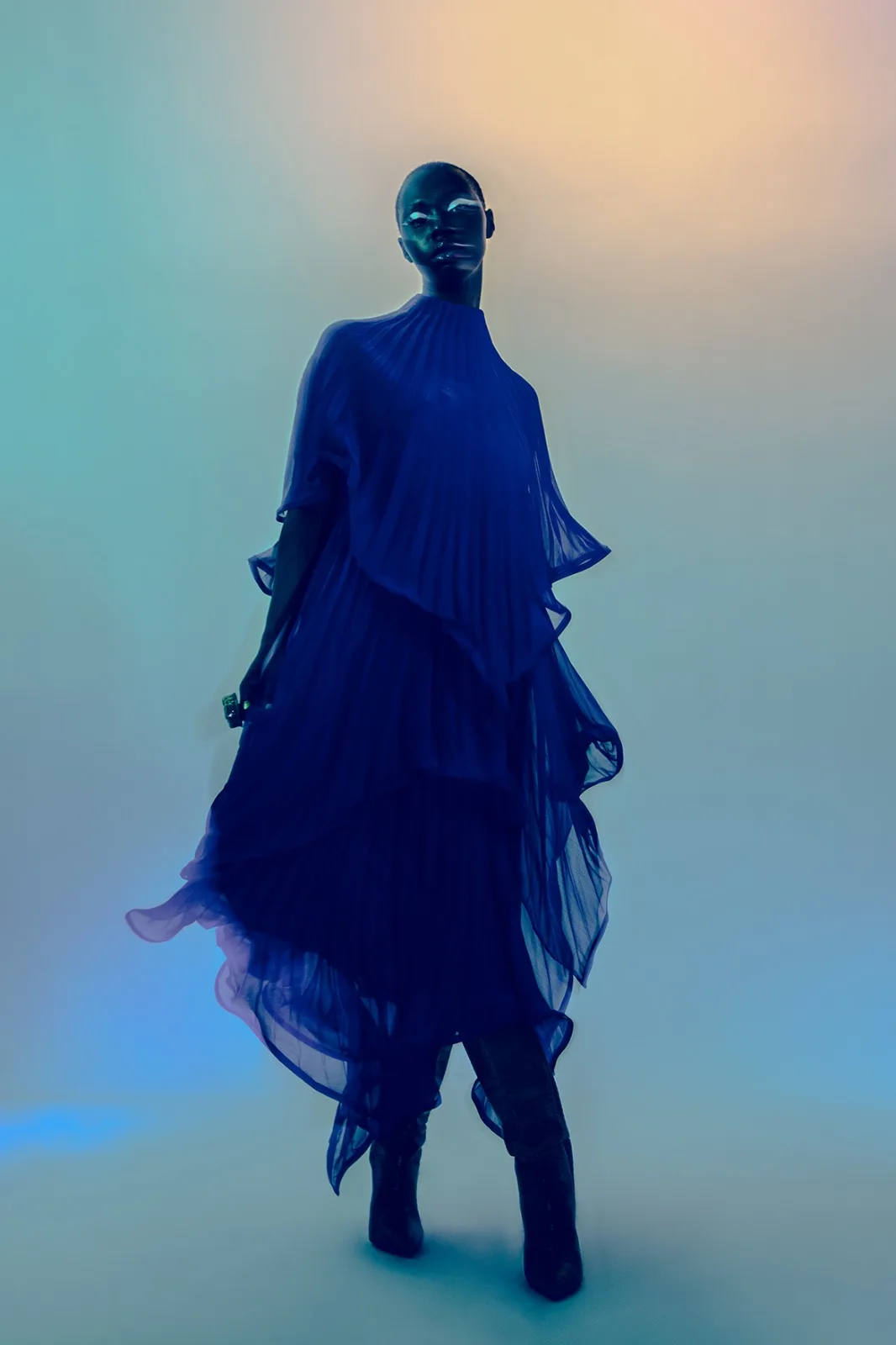 Figure in a flowing blue dress
