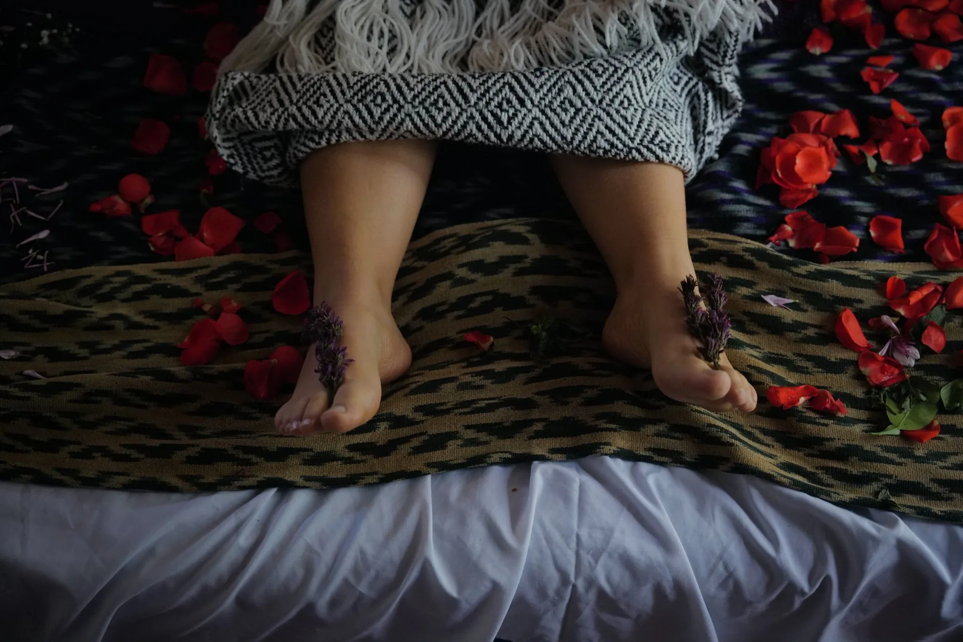 Feet on a bed of petals